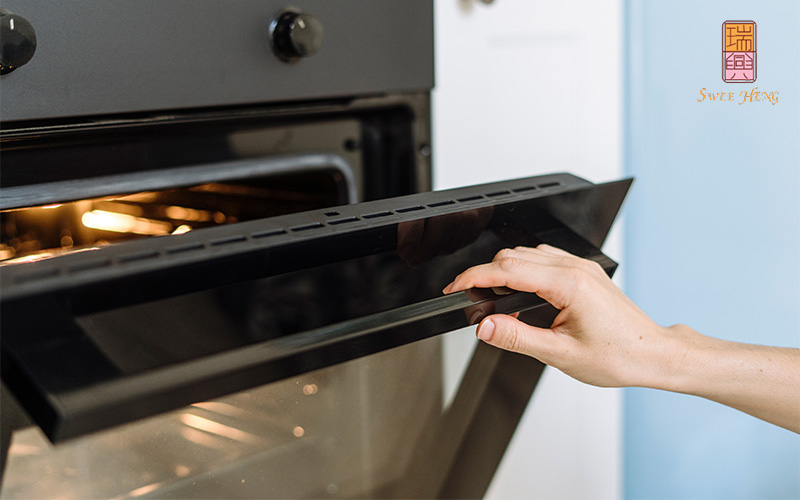 Opening an oven door